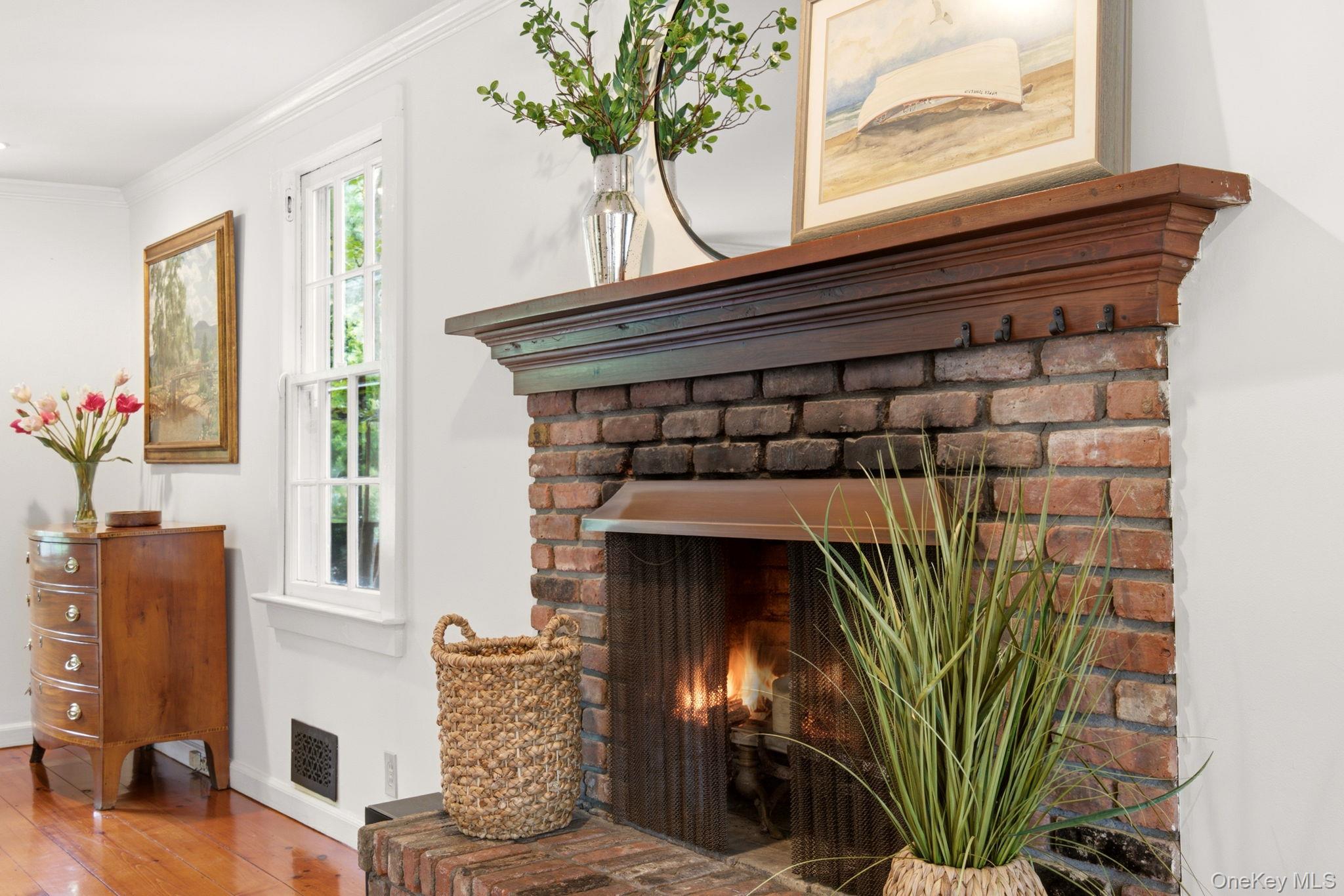 33 Prospect Road Centerport, NY 11721 - Photo 6 of 48 Original wood burning fire place in Living Room.
