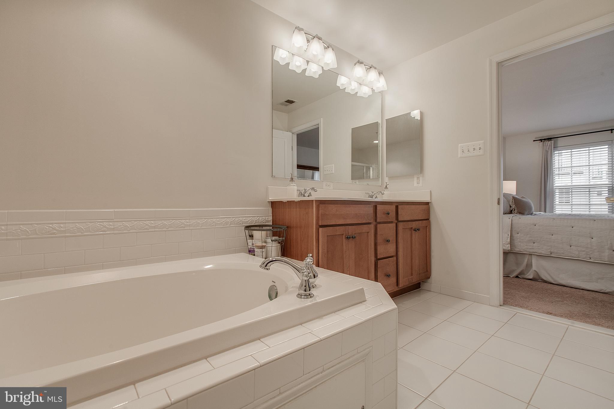 1792 Poolside Way, Unit 23B Frederick, MD 21701 - Photo 20 of 37 Tile Floors/Dual Sink/Soaking Tub