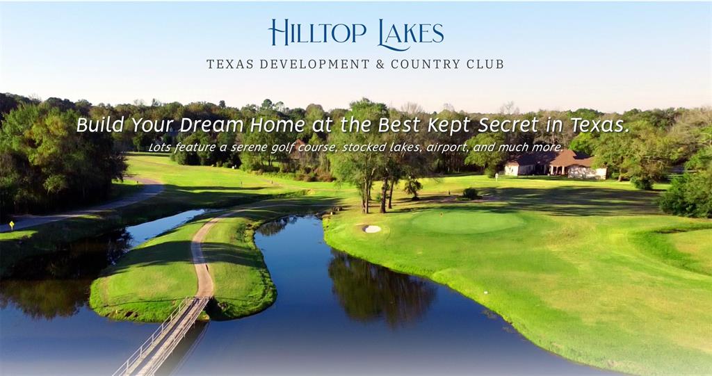 Lot 16 Pin Oak Normangee, TX 77871 - Photo 6 of 27 a view of a swimming pool with a garden and trees