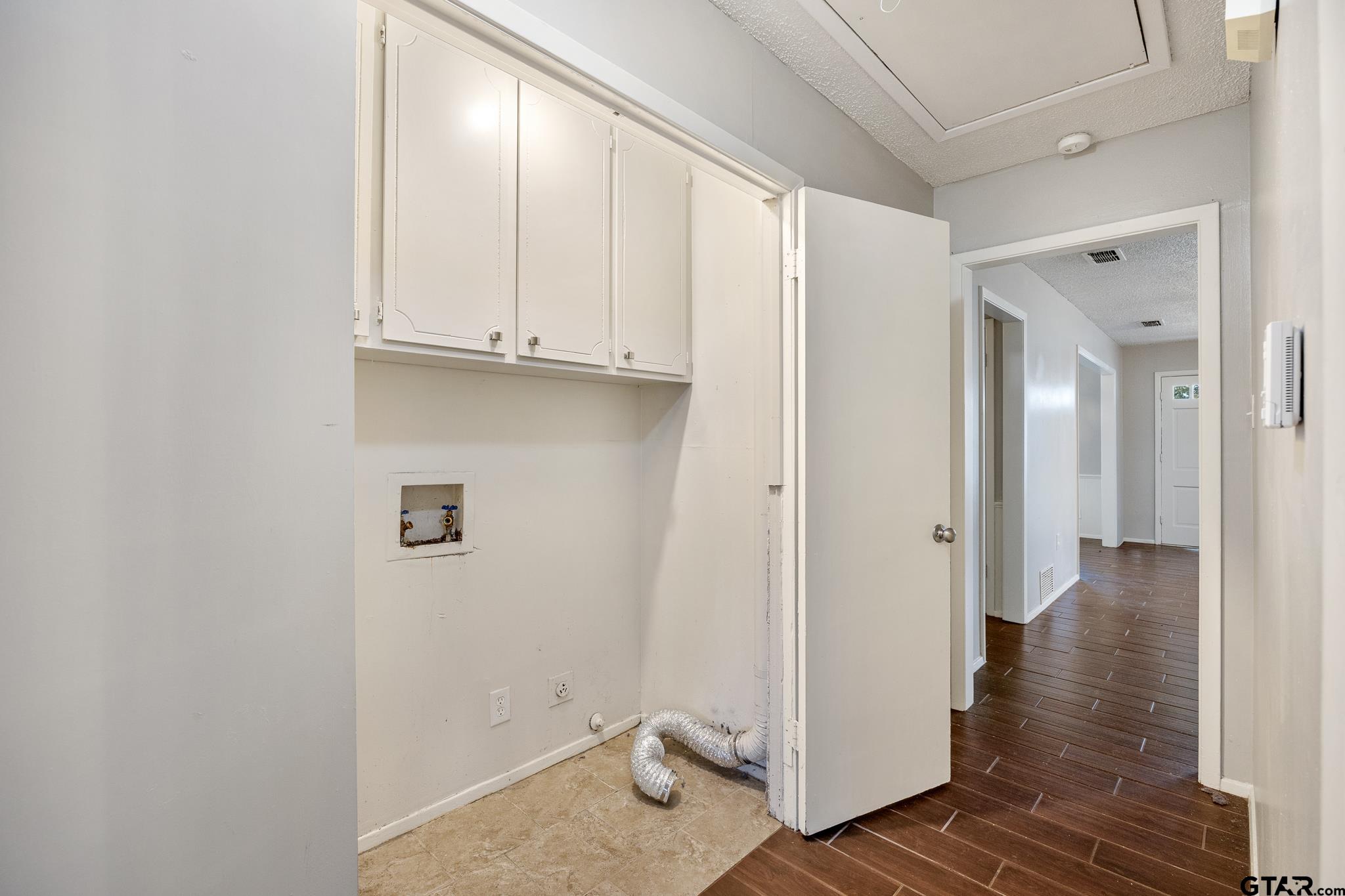 418 Boyd Lane Tyler, TX 75703 - Photo 12 of 25 a view of an entryway with wooden floor