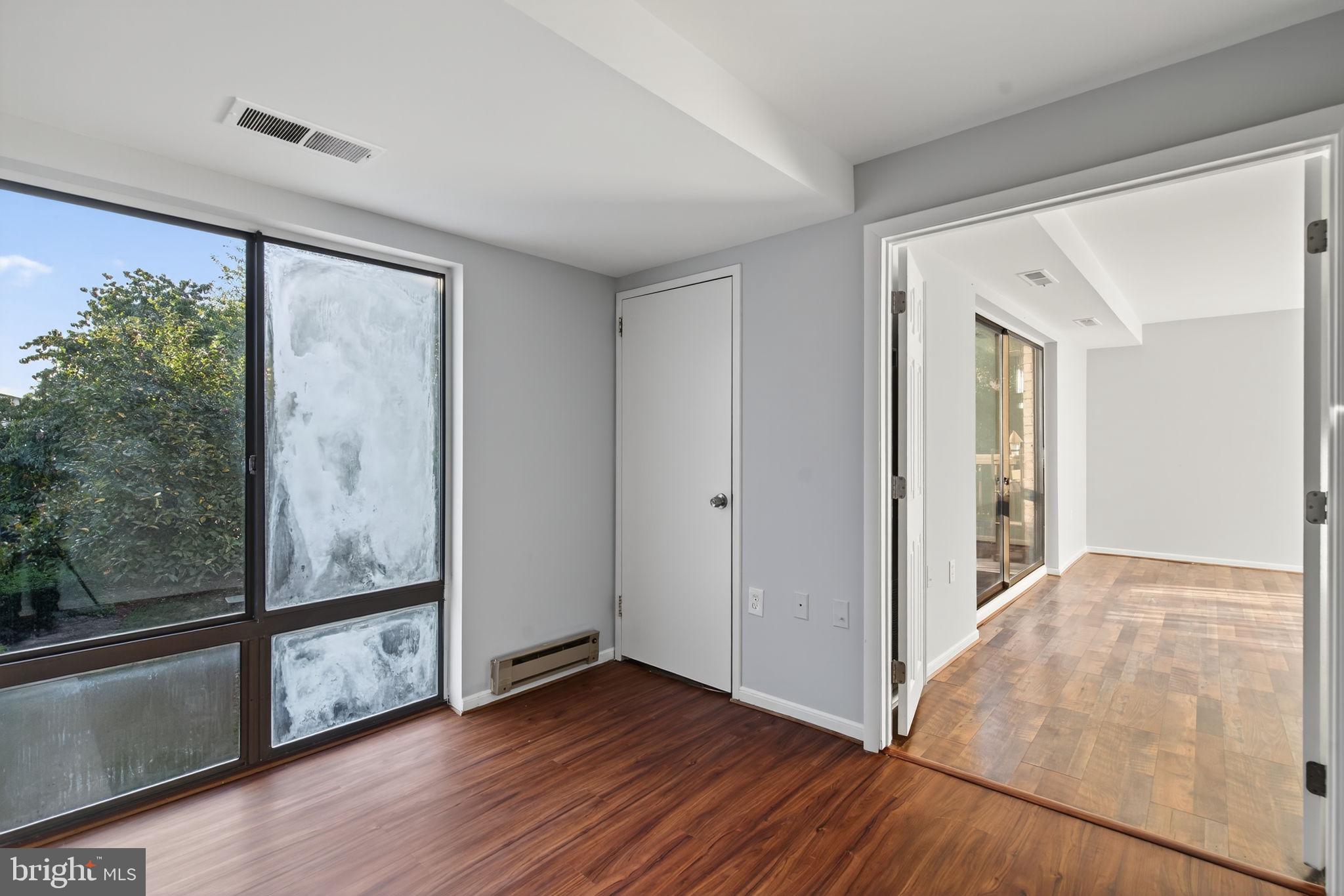 10006 Stedwick Road, Unit 204 Gaithersburg, MD 20886 - Photo 25 of 29 3rd room/ Den, Windows being replaced!