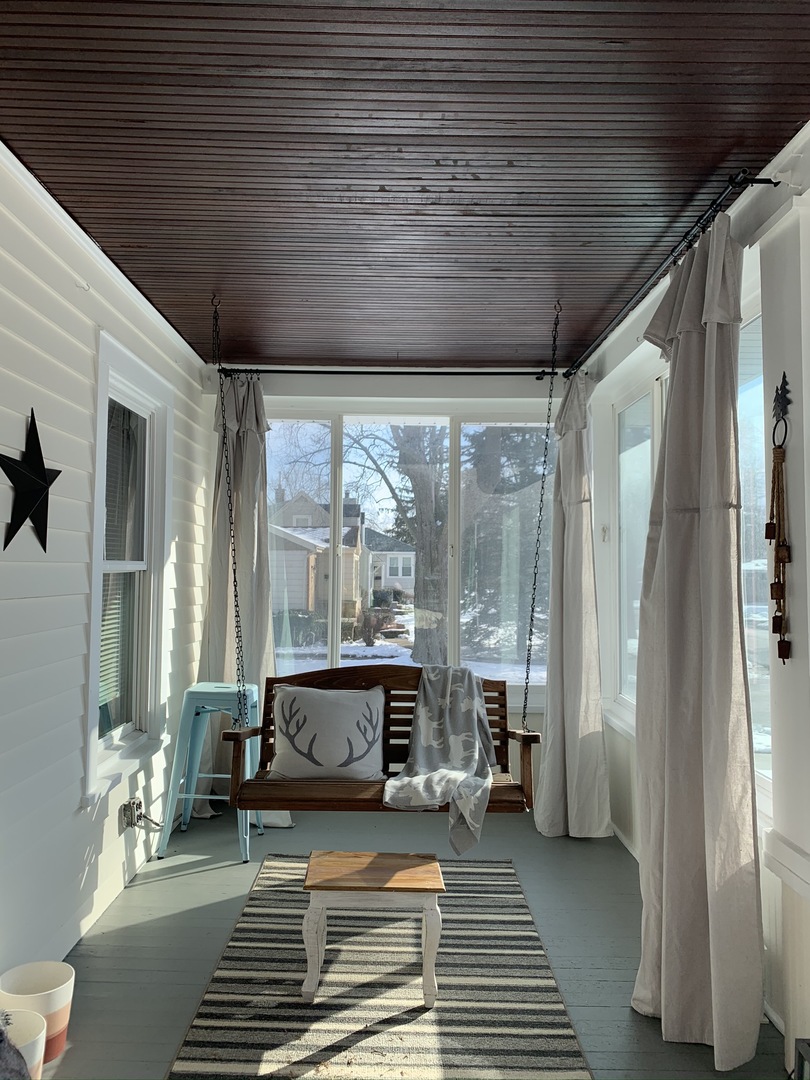 1908 Evergreen Road Homewood, IL 60430 - Photo 2 of 21 a living room with furniture a fireplace and a table