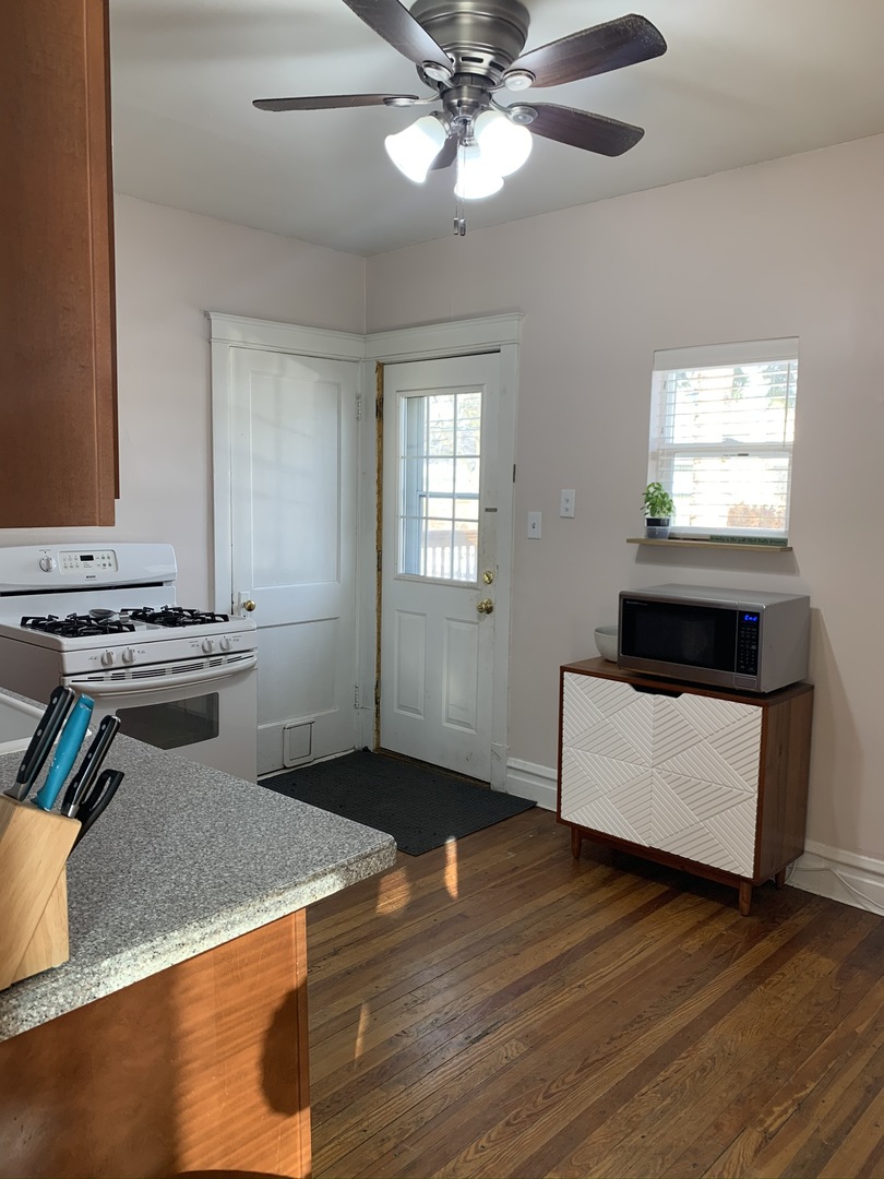 1908 Evergreen Road Homewood, IL 60430 - Photo 9 of 21 a living room with furniture and a wooden floor