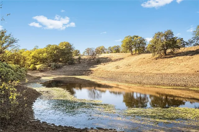 a view of a lake with a mountain in the background