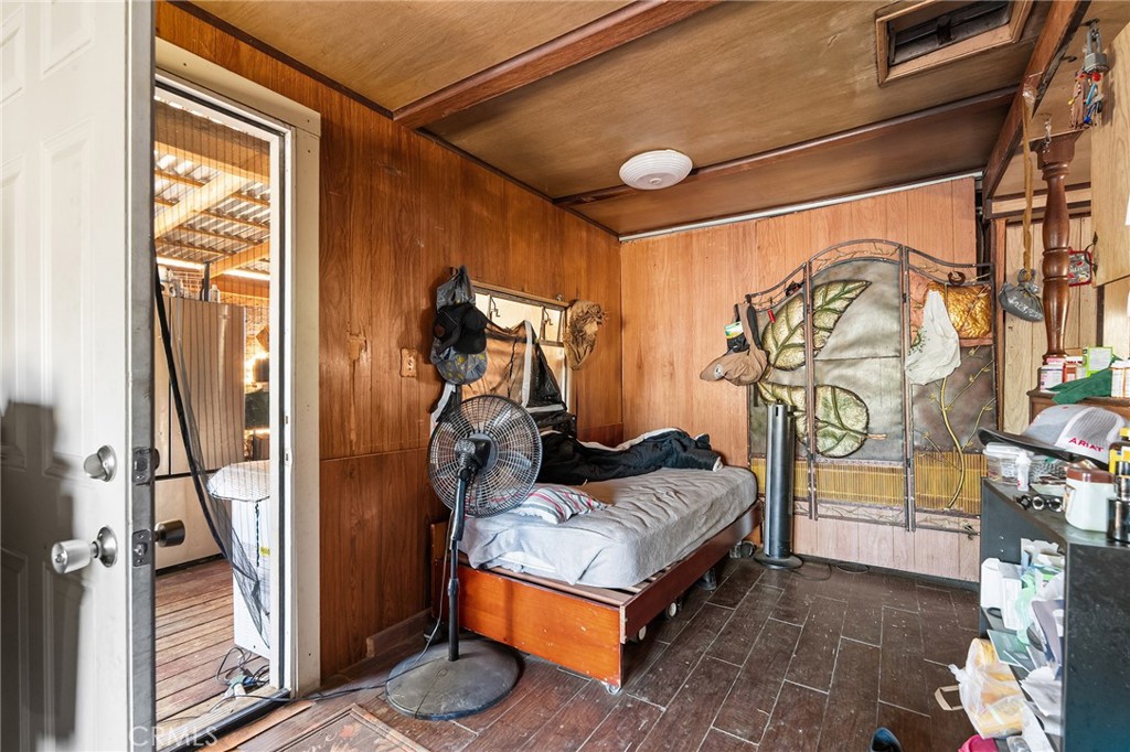 16925 Basler Road Cottonwood, CA 96022 - Photo 38 of 55 a bedroom with furniture and a window