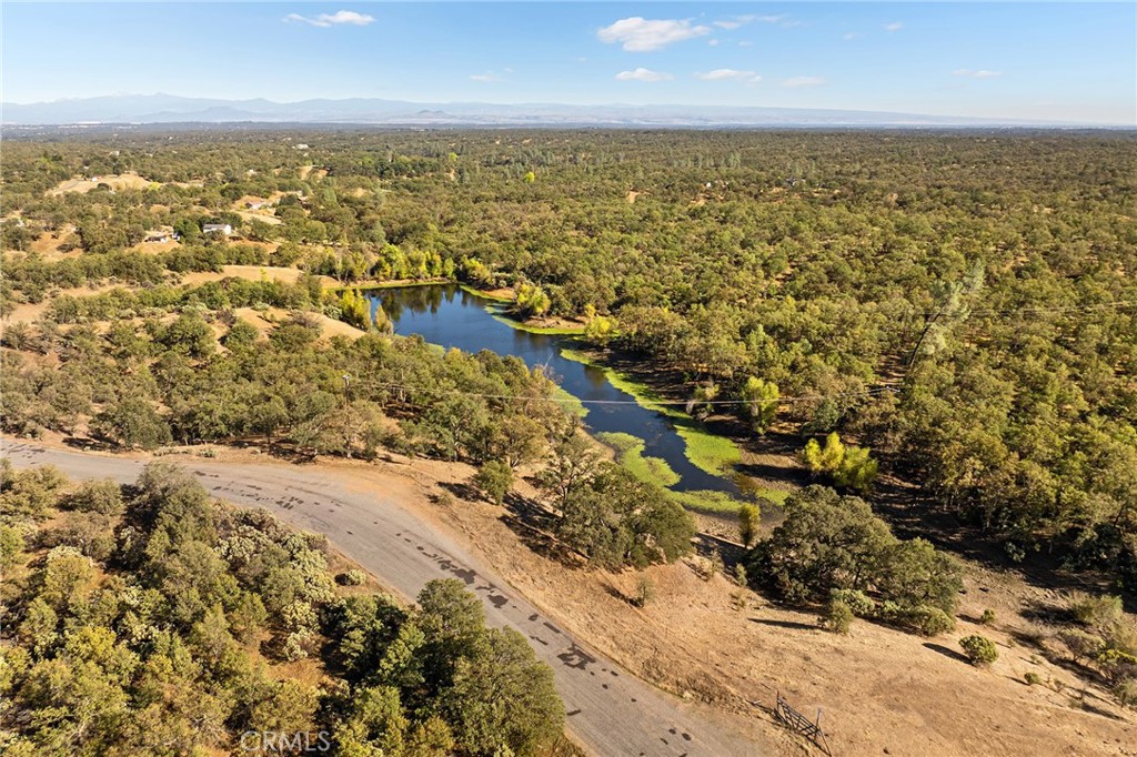 16925 Basler Road Cottonwood, CA 96022 - Photo 8 of 55 an aerial view of residential houses with outdoor space