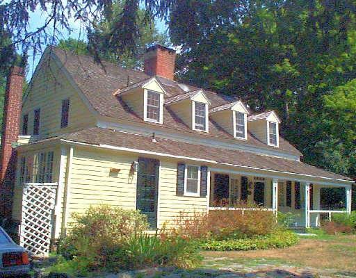 84 North Stamford Road Stamford, CT 06903 - Photo 1 of 1 a front view of a house with a yard