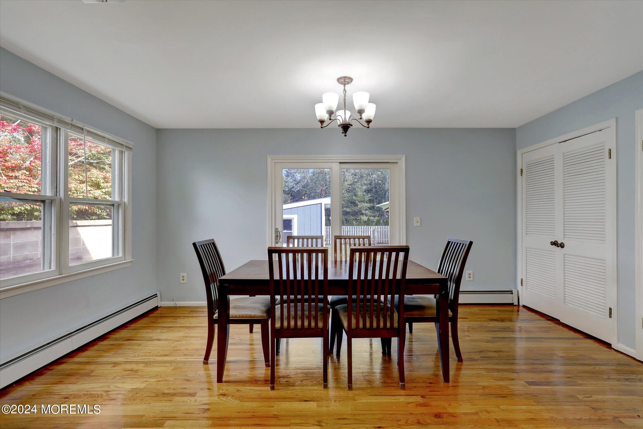 25 Hulse Landing Road Brick, NJ 08723 - Photo 11 of 28 a view of a dining room with furniture window and wooden floor