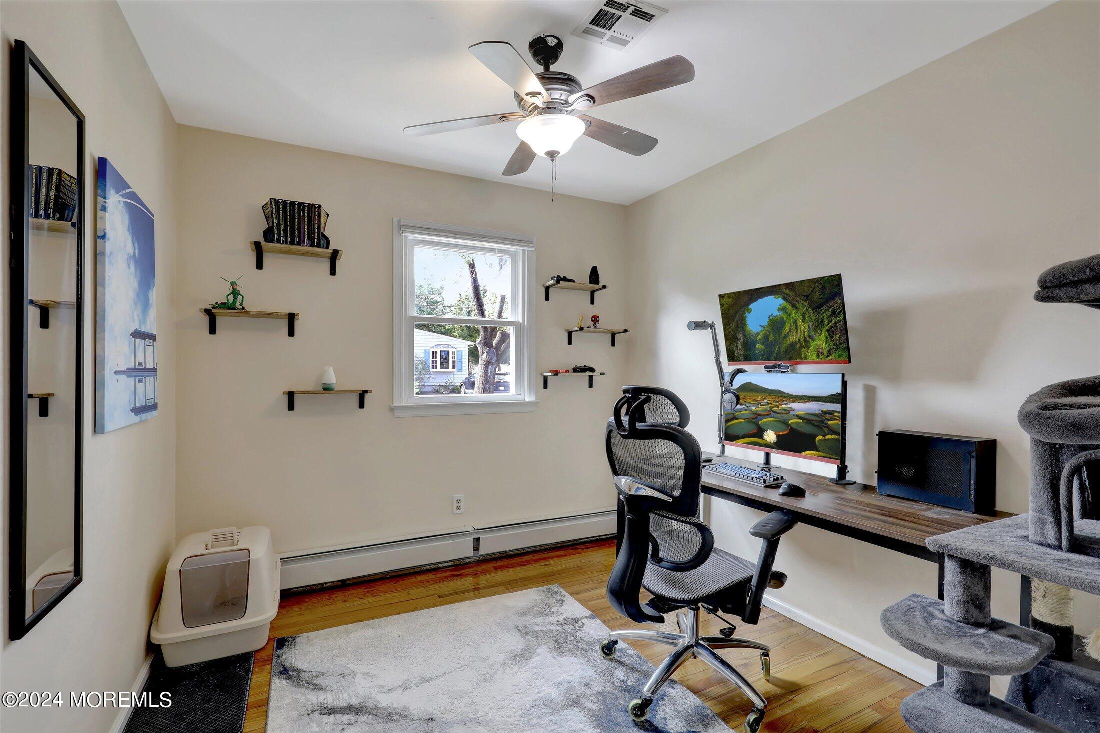 25 Hulse Landing Road Brick, NJ 08723 - Photo 17 of 28 a view of a workspace with furniture and a window