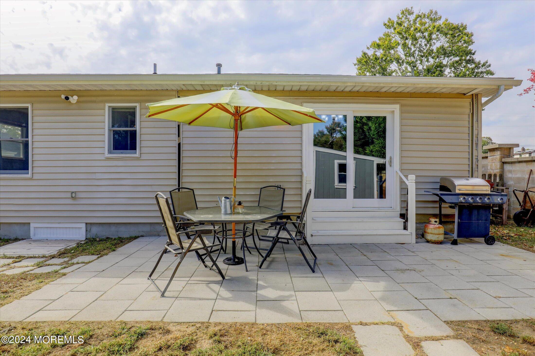 25 Hulse Landing Road Brick, NJ 08723 - Photo 20 of 28 a view of a house with backyard and sitting area