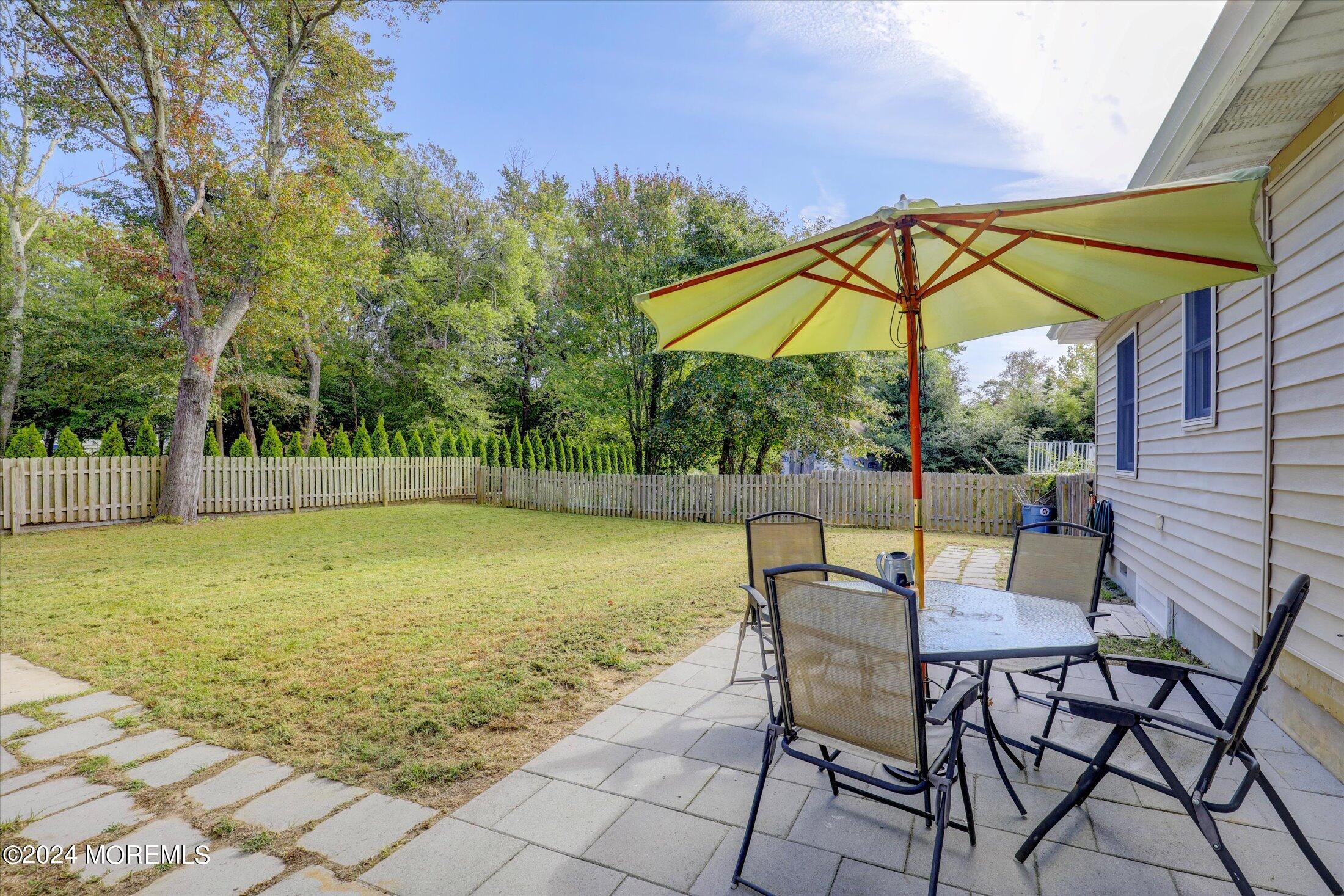 25 Hulse Landing Road Brick, NJ 08723 - Photo 21 of 28 a view of a chair and table on the patio