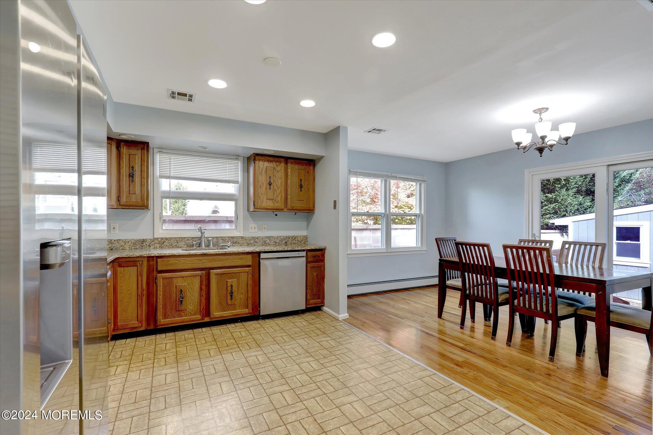25 Hulse Landing Road Brick, NJ 08723 - Photo 6 of 28 a large kitchen with a table and chairs