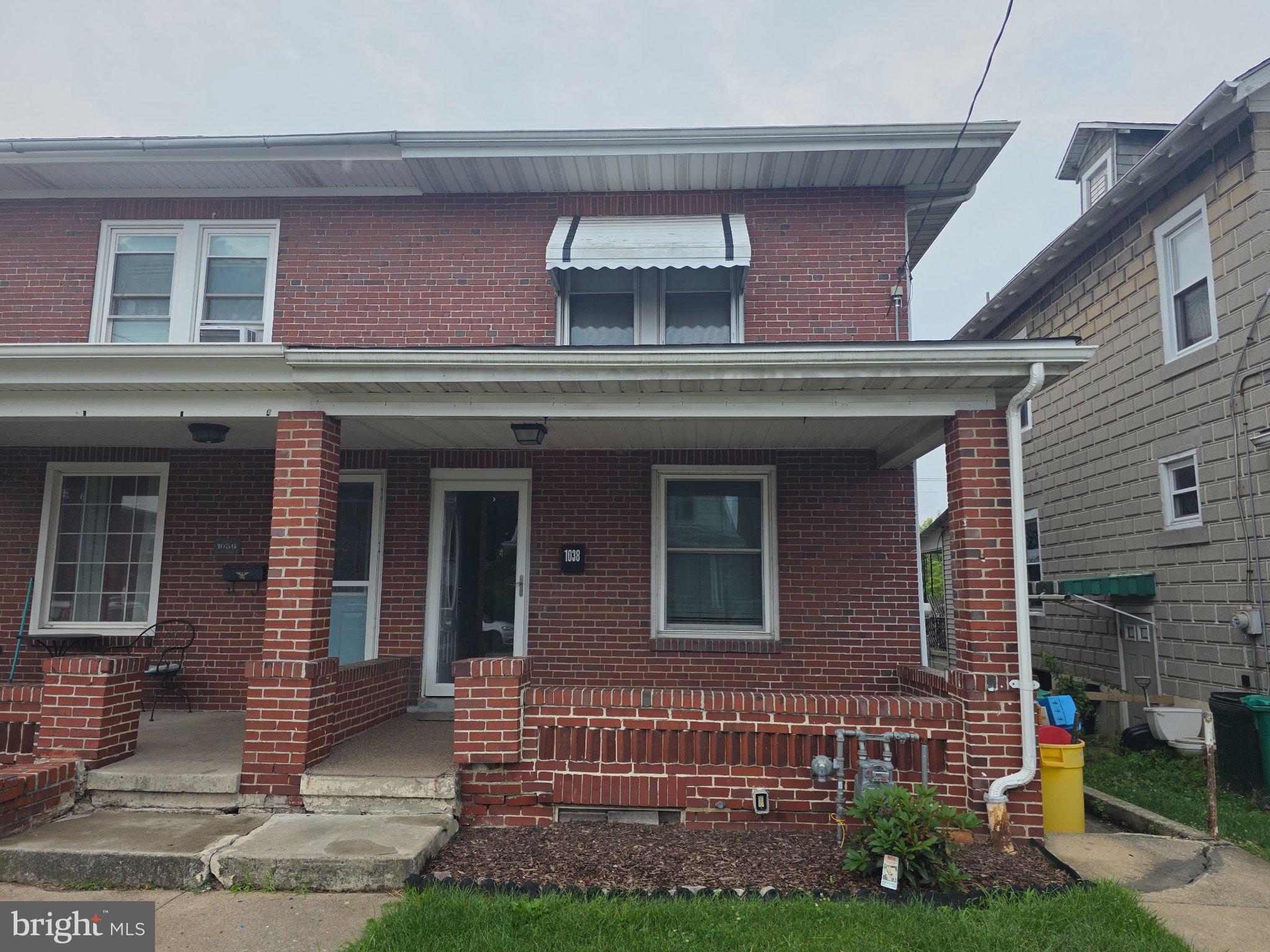 1038 Fern Avenue Reading, PA 19607 - Photo 1 of 5 Charming brick duplex with inviting porch.