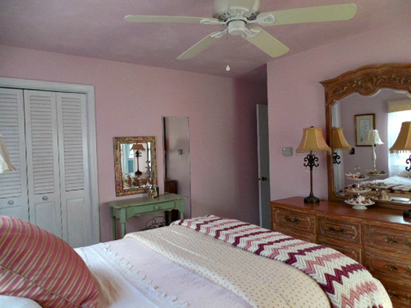 20 Farrington Road Barre, MA 01005 - Photo 17 of 28 a bedroom with a bed and a chandelier