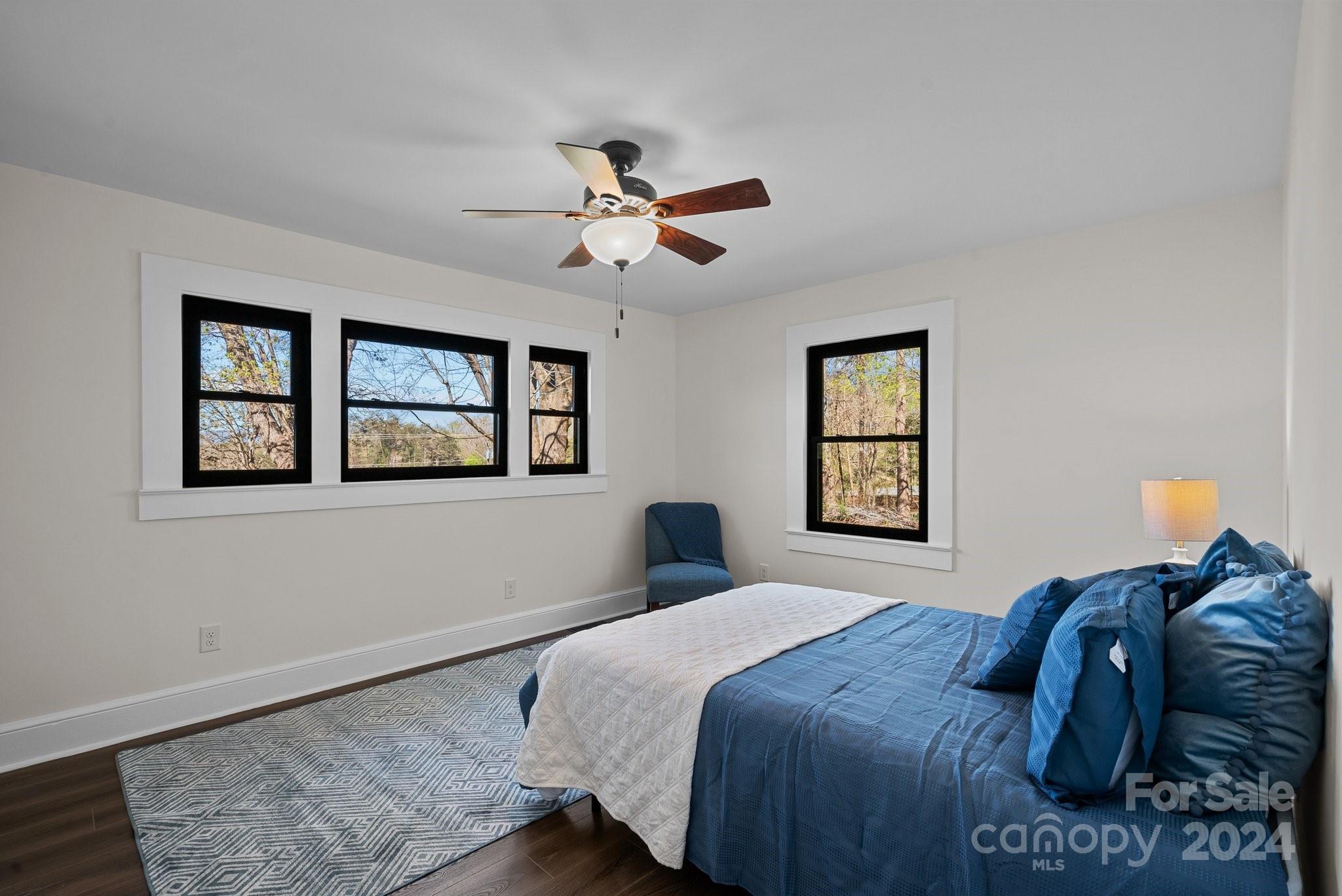 1820 Baber Road, Unit 4 Rutherfordton, NC 28139 - Photo 14 of 28 a bedroom with a large bed and a window