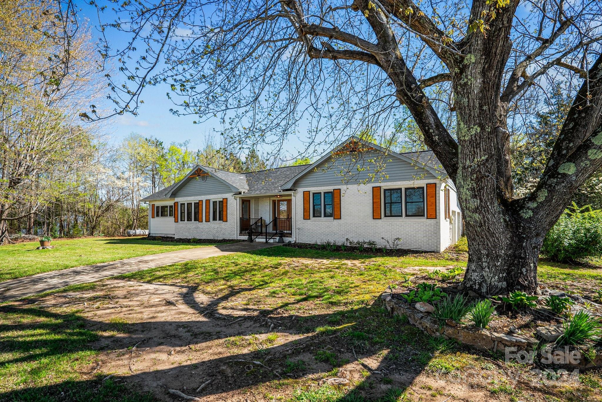 1820 Baber Road, Unit 4 Rutherfordton, NC 28139 - Photo 24 of 28 a front view of a house with garden
