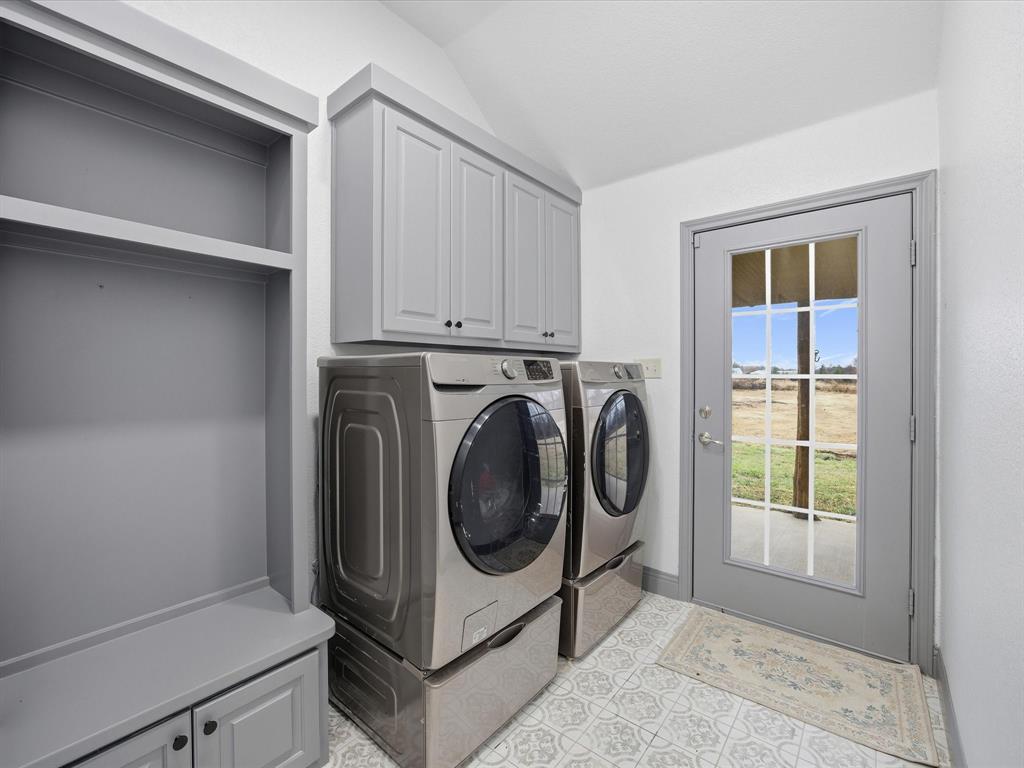 1161 County Road 2175 Decatur, TX 76234 - Photo 18 of 20 a utility room with dryer and washer
