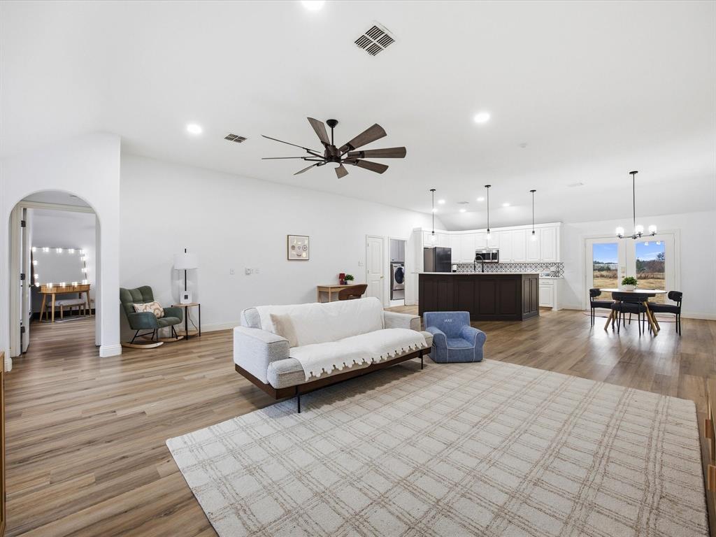 1161 County Road 2175 Decatur, TX 76234 - Photo 4 of 20 a living room with furniture and a fireplace