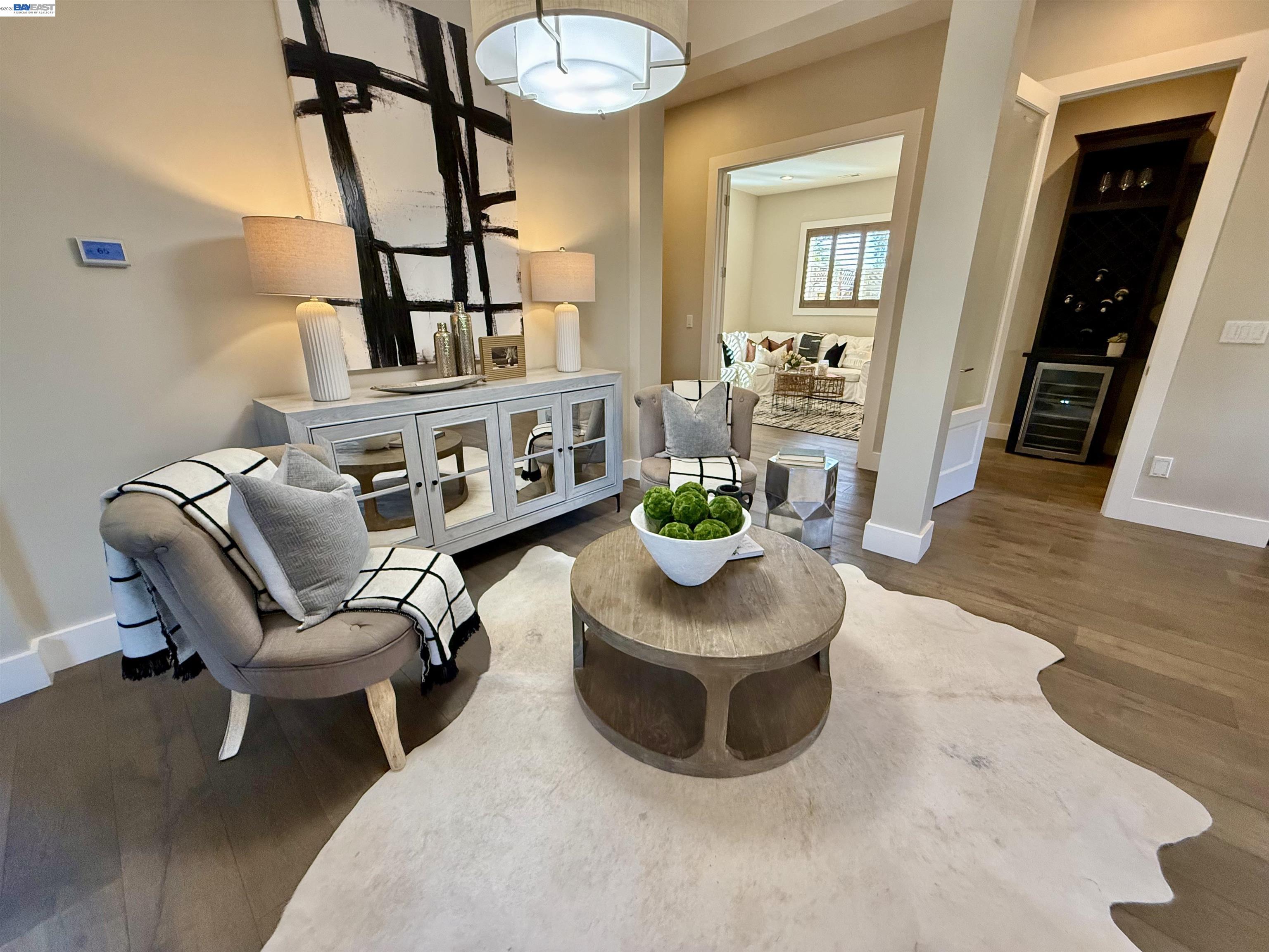 1500 Arroyo Road Livermore, CA 94550 - Photo 12 of 58 a living room with furniture and a potted plant