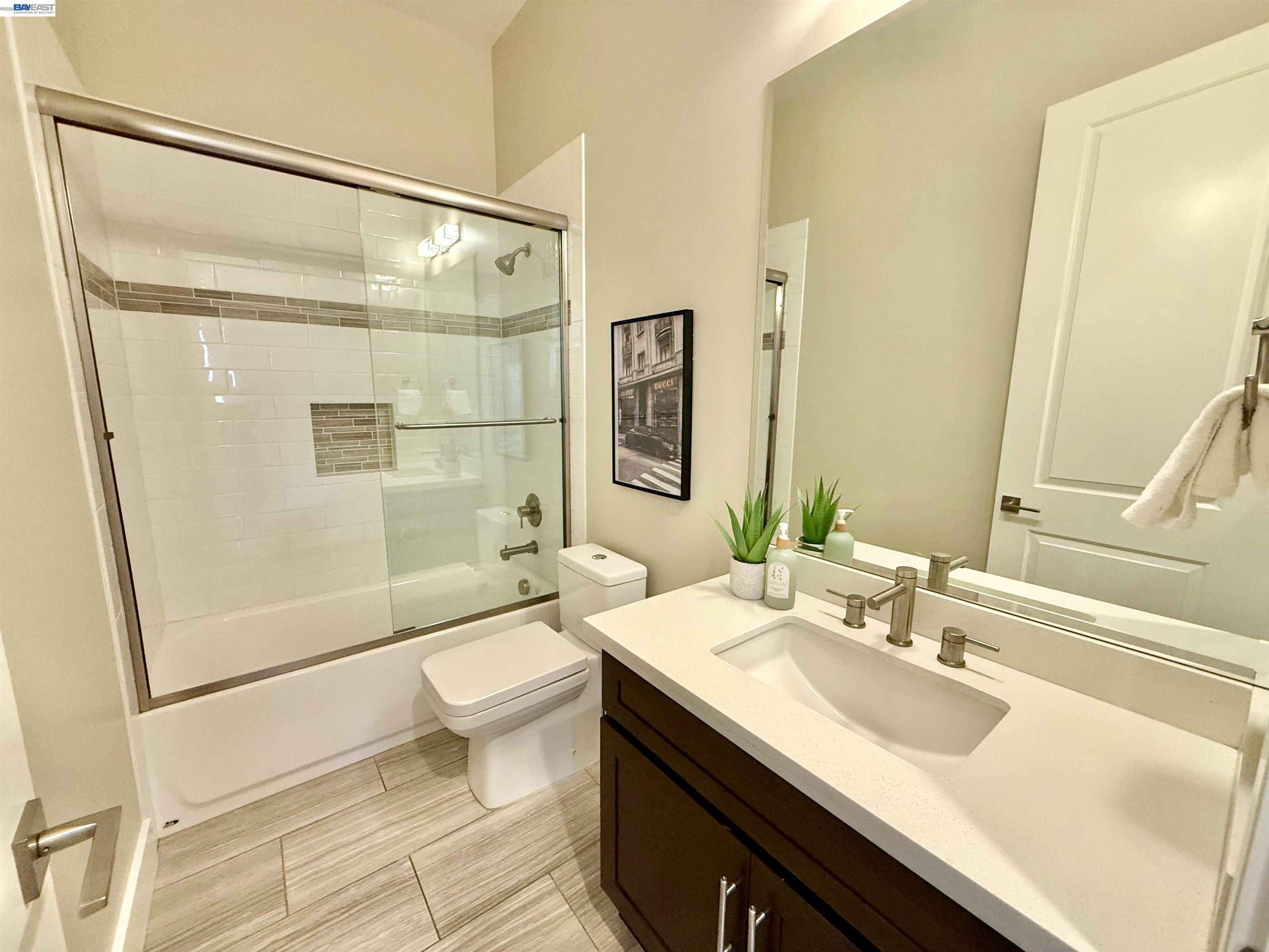 1500 Arroyo Road Livermore, CA 94550 - Photo 29 of 58 a bathroom with a sink a toilet and shower