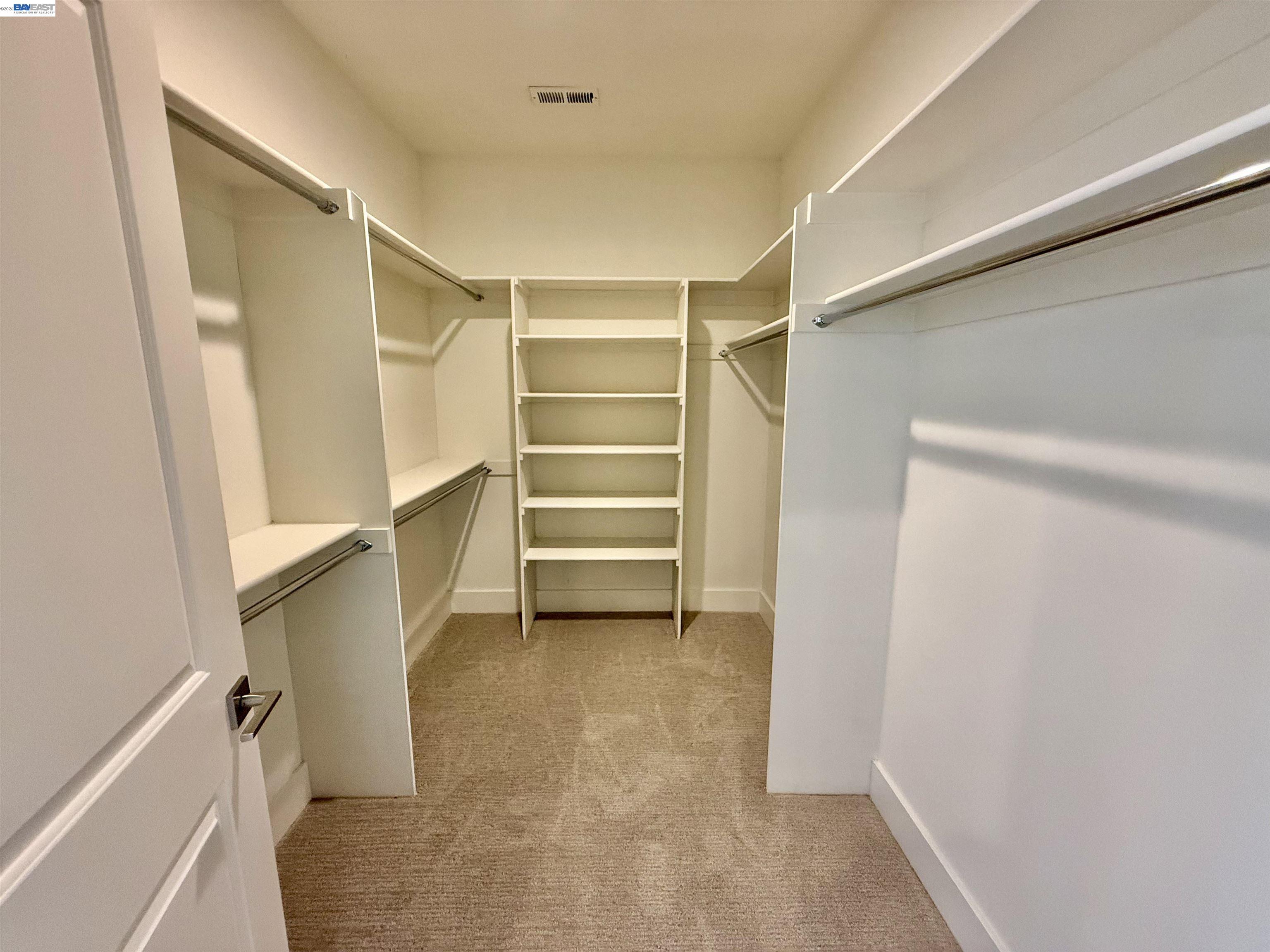 1500 Arroyo Road Livermore, CA 94550 - Photo 35 of 58 a view of walk in closet with empty racks