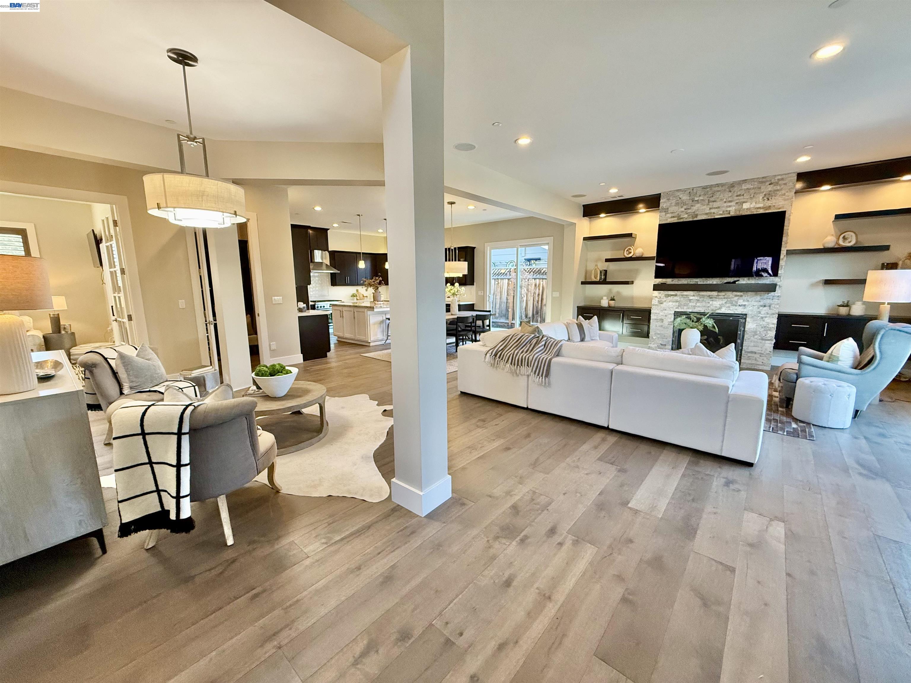 1500 Arroyo Road Livermore, CA 94550 - Photo 6 of 58 a living room with furniture and a flat screen tv