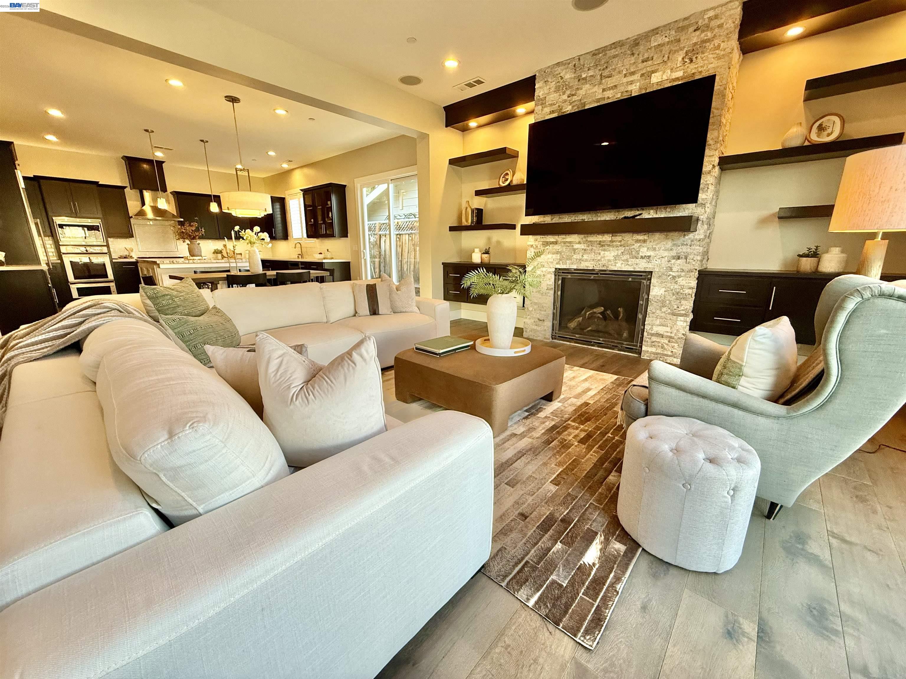 1500 Arroyo Road Livermore, CA 94550 - Photo 7 of 58 a living room with fireplace furniture and a flat screen tv