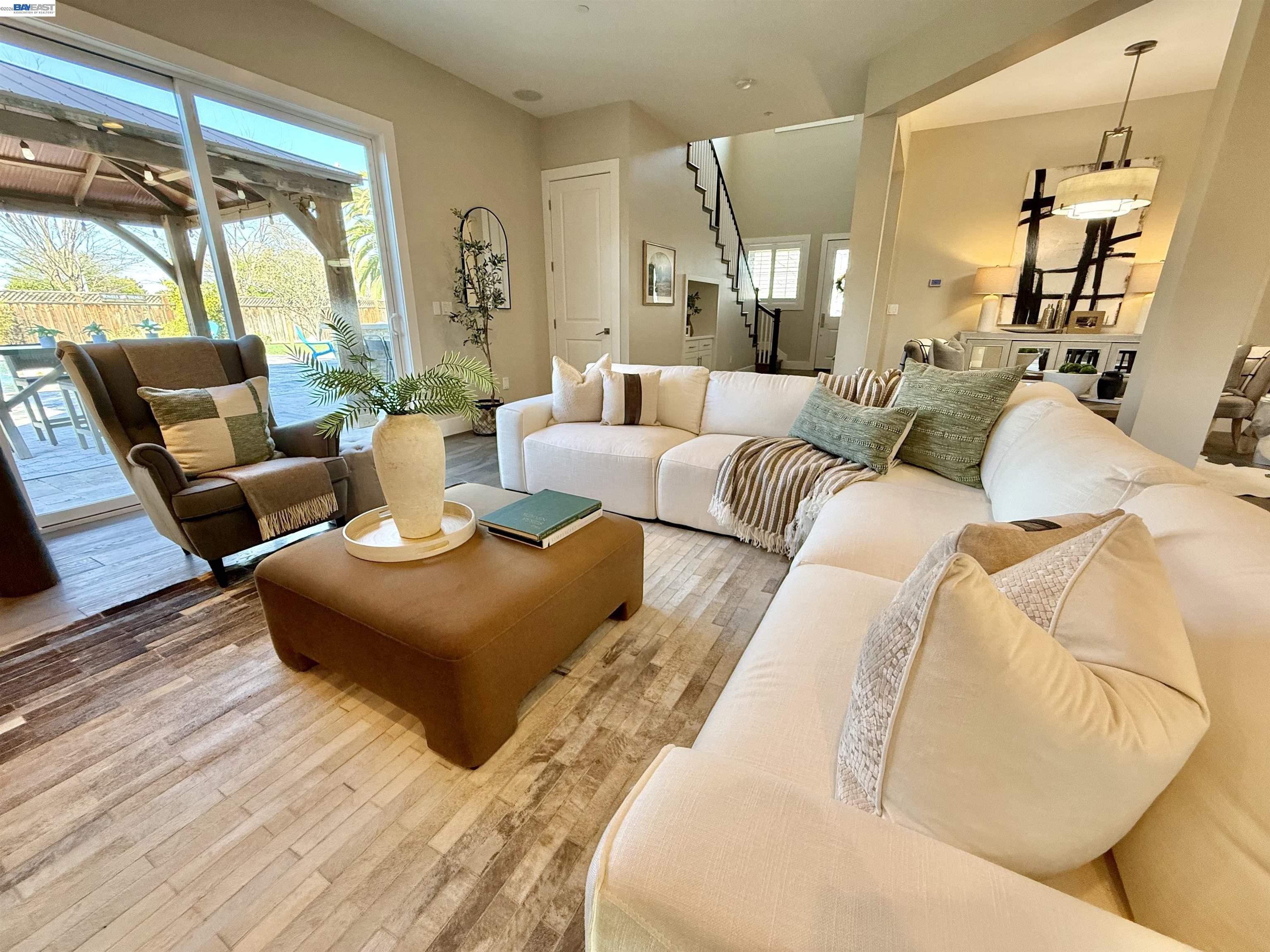 1500 Arroyo Road Livermore, CA 94550 - Photo 10 of 58 a living room with furniture and a large window