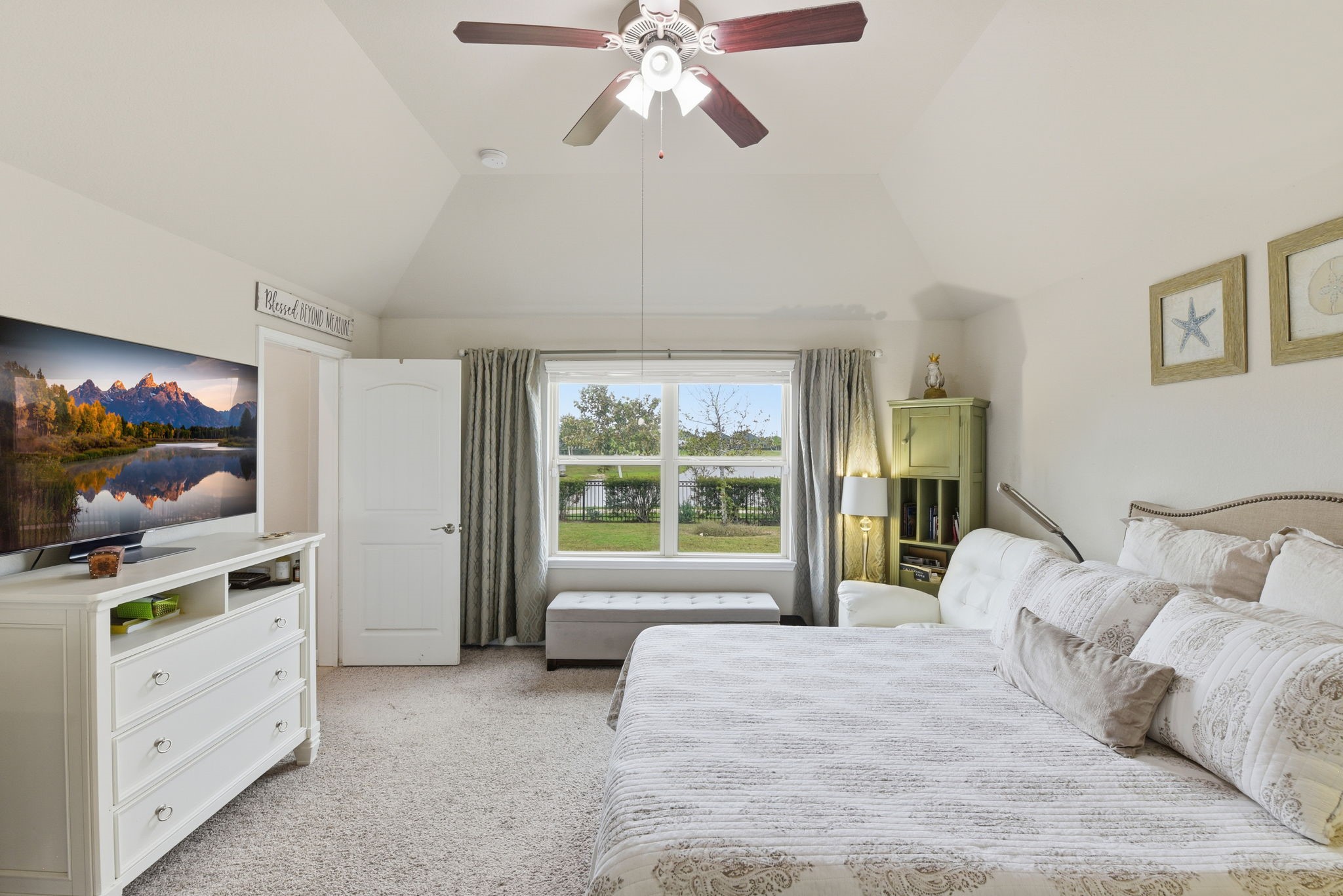 1502 City Lake Place Houston, TX 77047 - Photo 15 of 36 a bedroom with a bed and a flat screen tv