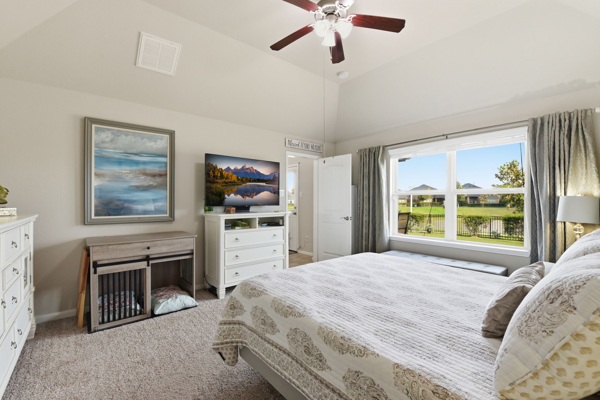 1502 City Lake Place Houston, TX 77047 - Photo 16 of 36 a bedroom with a large bed and a window