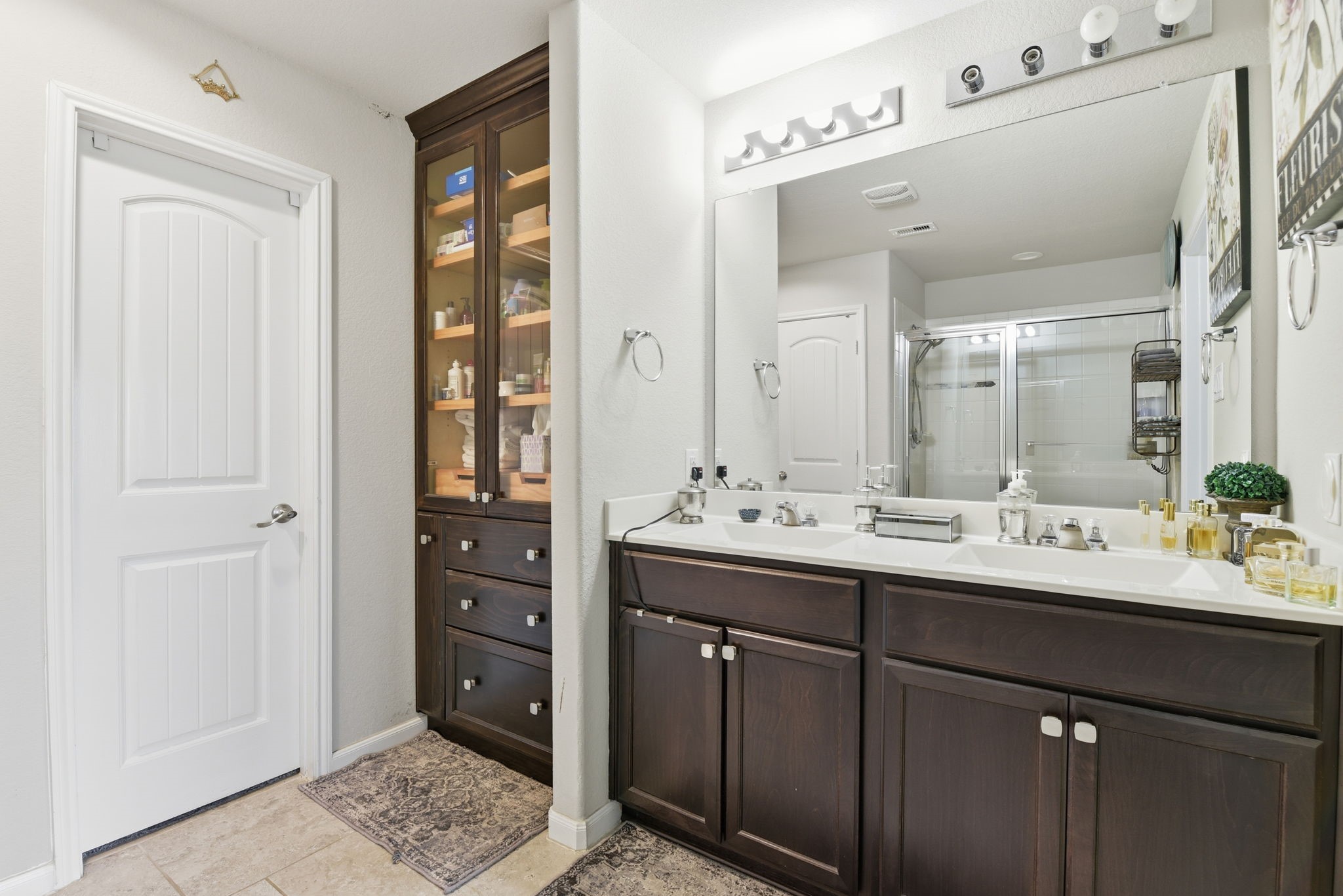 1502 City Lake Place Houston, TX 77047 - Photo 19 of 36 a bathroom with a double vanity sink and mirror