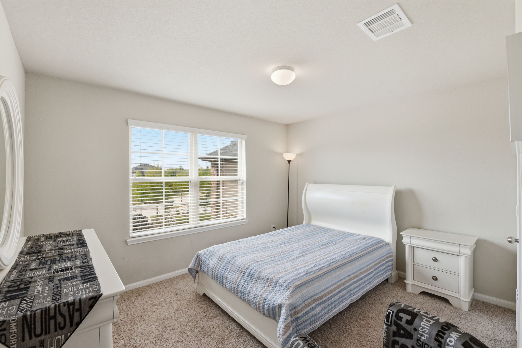 1502 City Lake Place Houston, TX 77047 - Photo 23 of 36 a bedroom with a bed and a window
