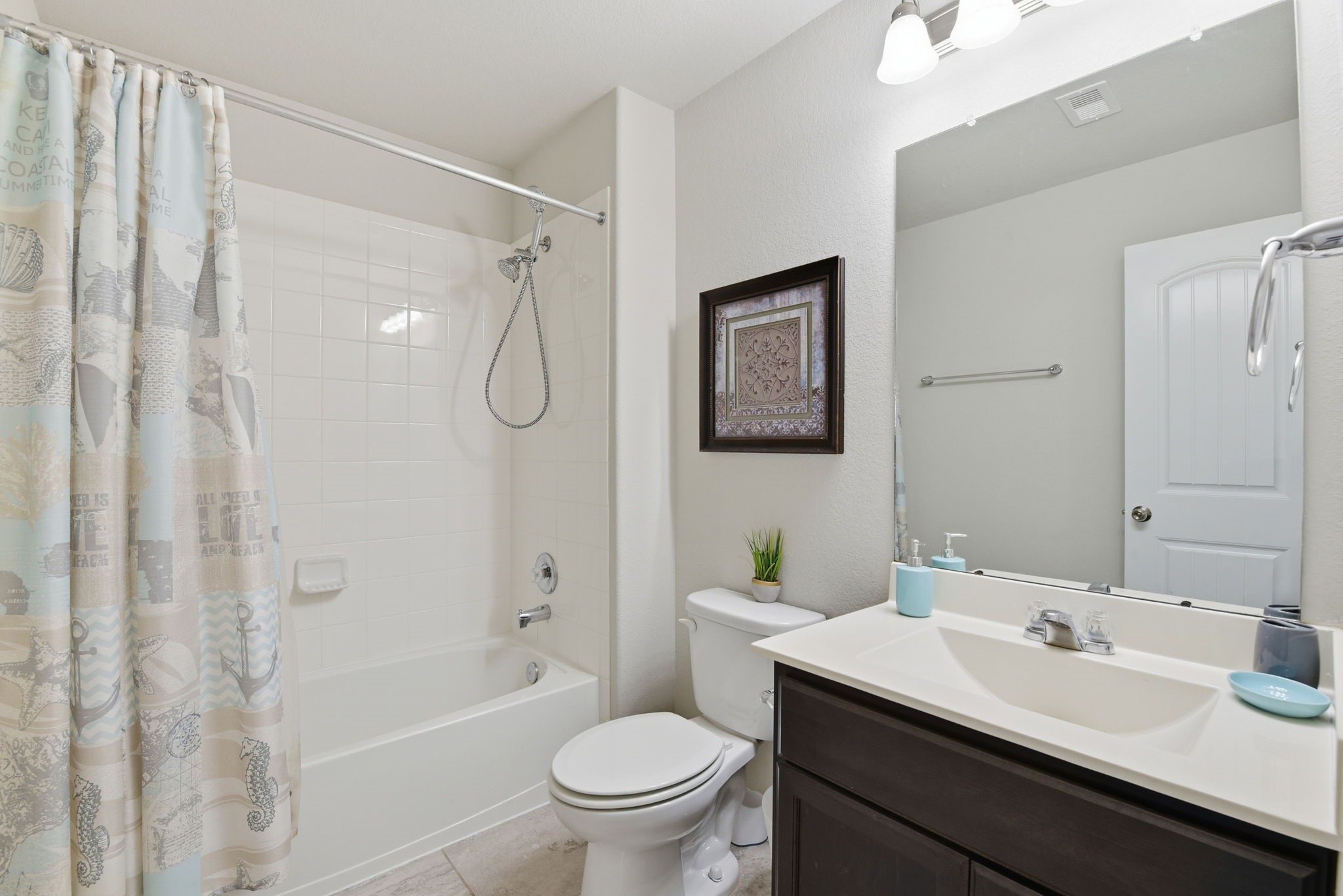1502 City Lake Place Houston, TX 77047 - Photo 26 of 36 a bathroom with a sink toilet vanity and shower