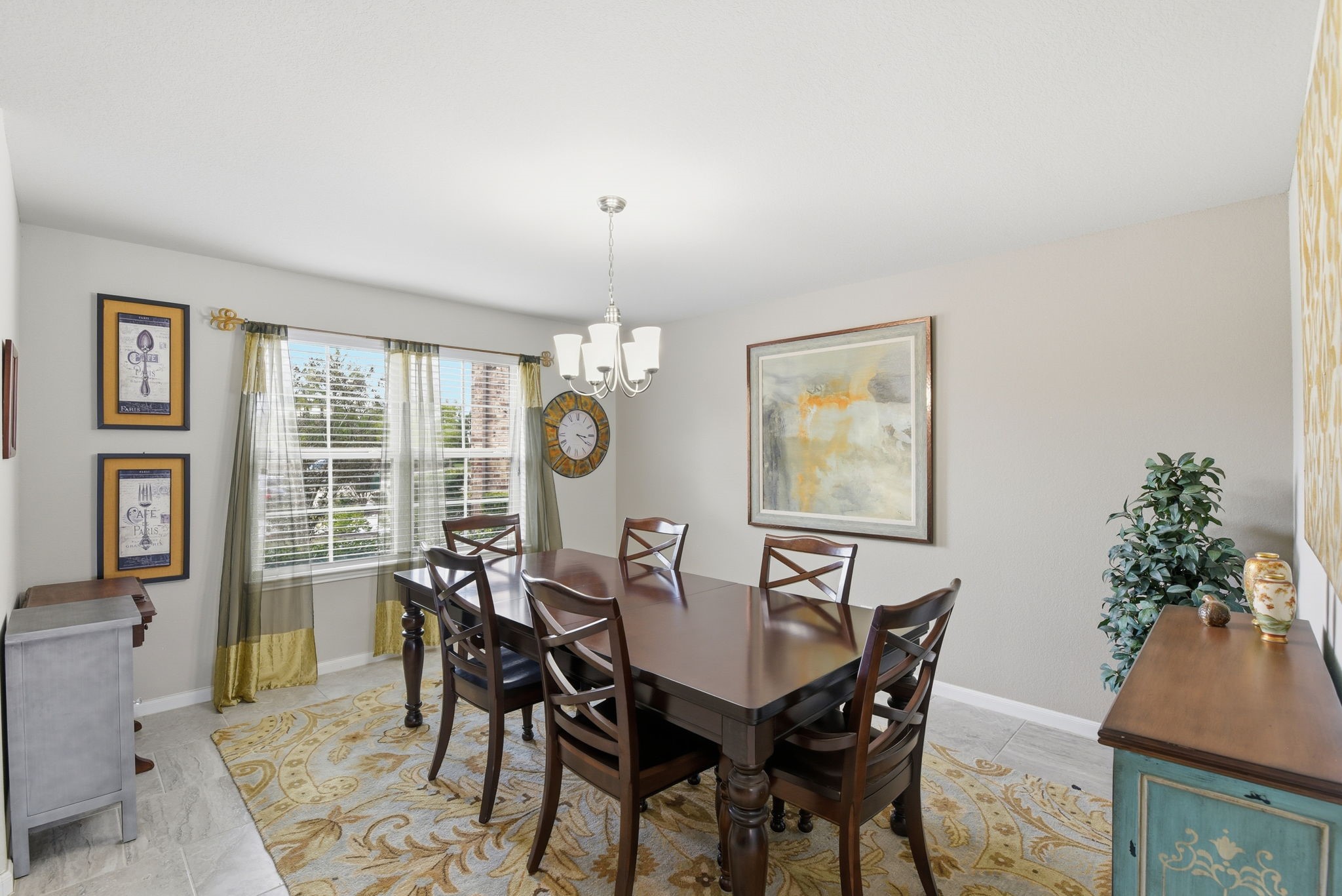 1502 City Lake Place Houston, TX 77047 - Photo 5 of 36 a view of a dining room with furniture window and wooden floor