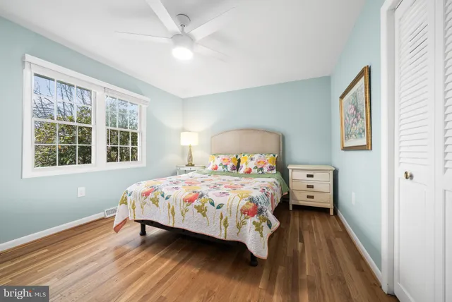 a view of a livingroom with furniture and a flat screen tv