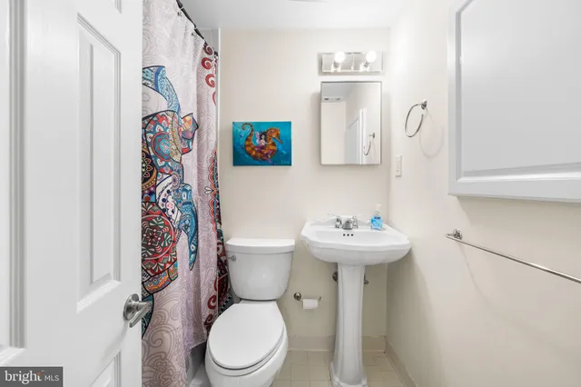 a view of a yard with basketball court