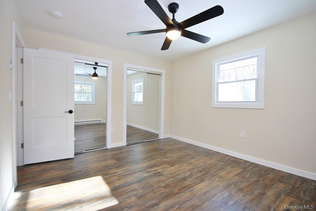 6 Buck Hill Road Wurtsboro, NY 12790 - Photo 33 of 43 wooden floor in an empty room with a window