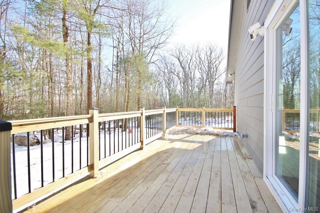 6 Buck Hill Road Wurtsboro, NY 12790 - Photo 8 of 43 a view of a balcony with wooden floor