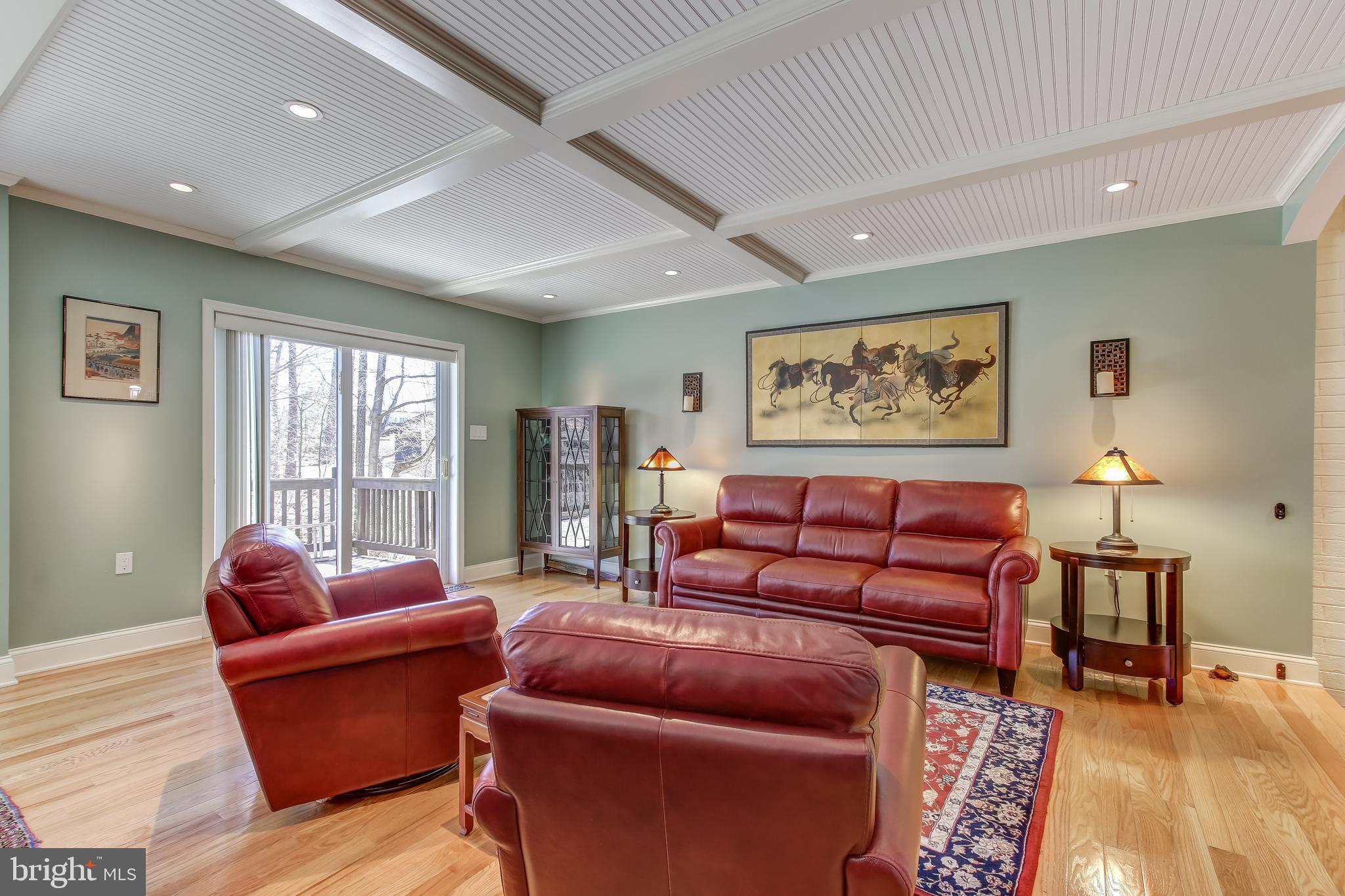 8120 Inverness Ridge Road Potomac, MD 20854 - Photo 15 of 42 a living room with furniture a rug and a large window