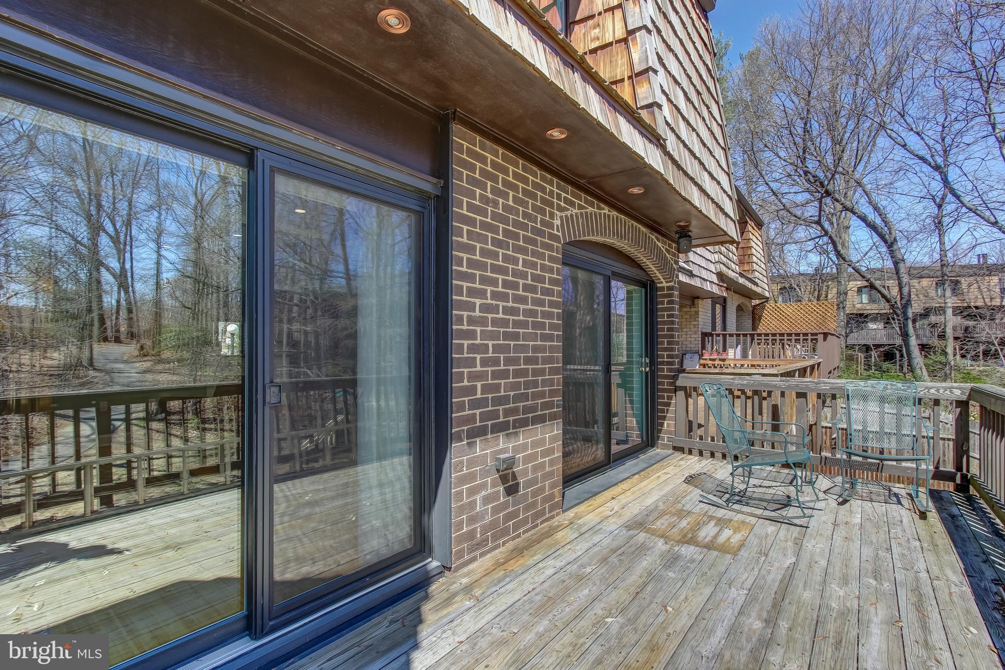 8120 Inverness Ridge Road Potomac, MD 20854 - Photo 23 of 42 a view of a balcony with wooden floor