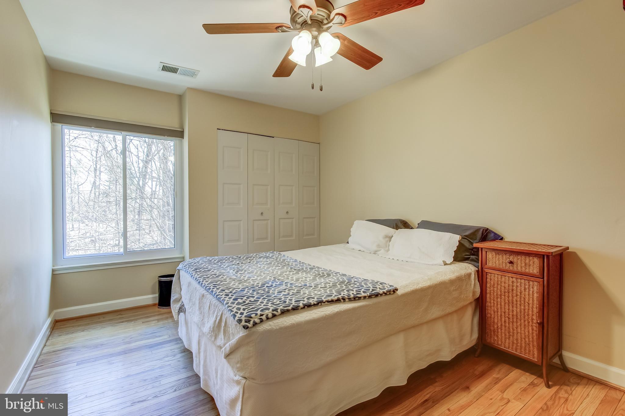 8120 Inverness Ridge Road Potomac, MD 20854 - Photo 25 of 42 a room with a bed and a chandelier