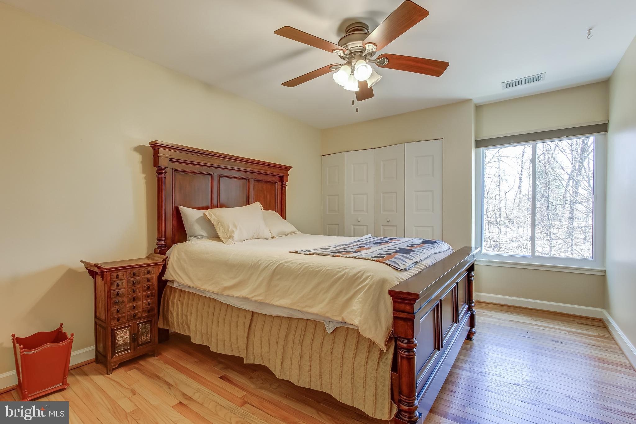 8120 Inverness Ridge Road Potomac, MD 20854 - Photo 27 of 42 a bed sitting in a bedroom next to a window
