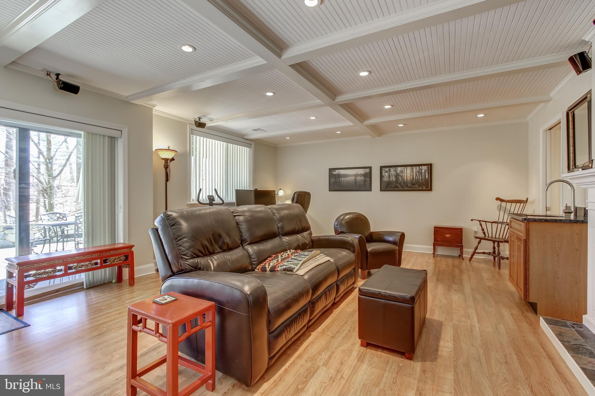 8120 Inverness Ridge Road Potomac, MD 20854 - Photo 37 of 42 a living room with furniture and a wooden floor