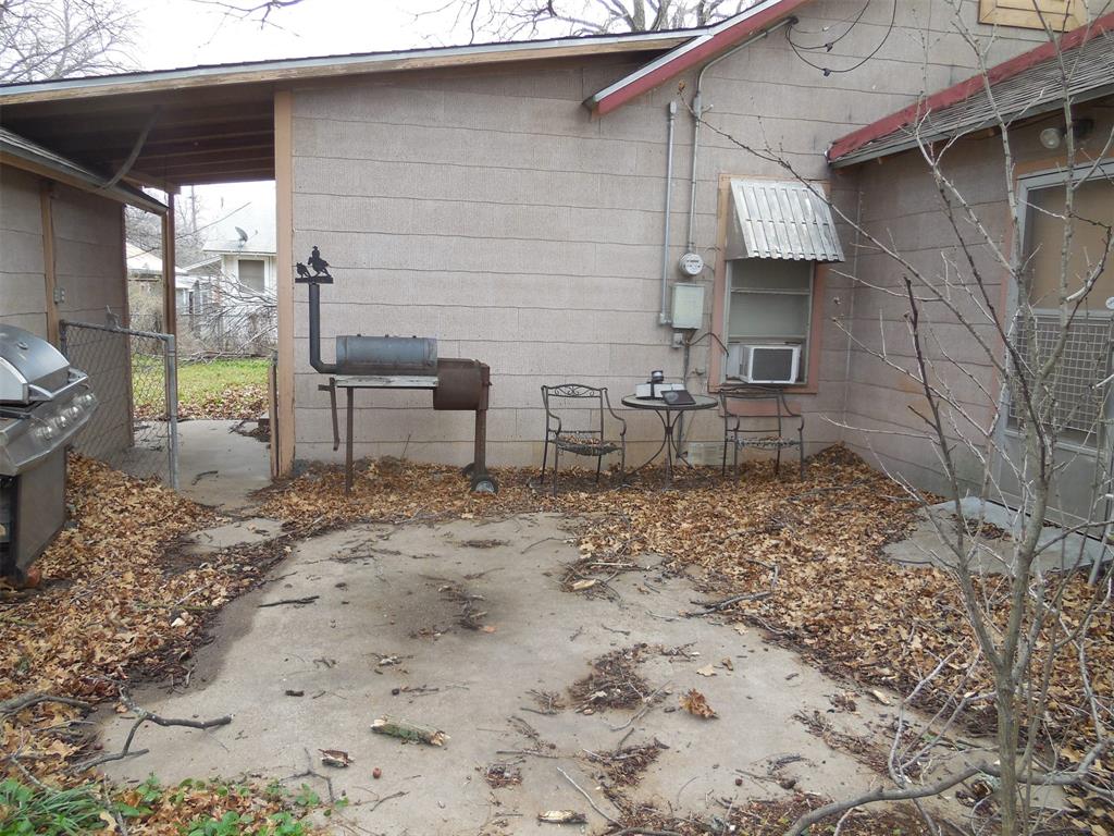 610 West Main Street Ranger, TX 76470 - Photo 14 of 17 Concrete patio