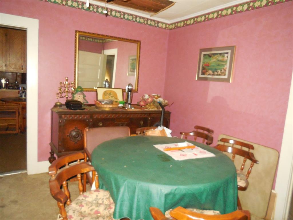 610 West Main Street Ranger, TX 76470 - Photo 7 of 17 Dining area featuring carpet floors