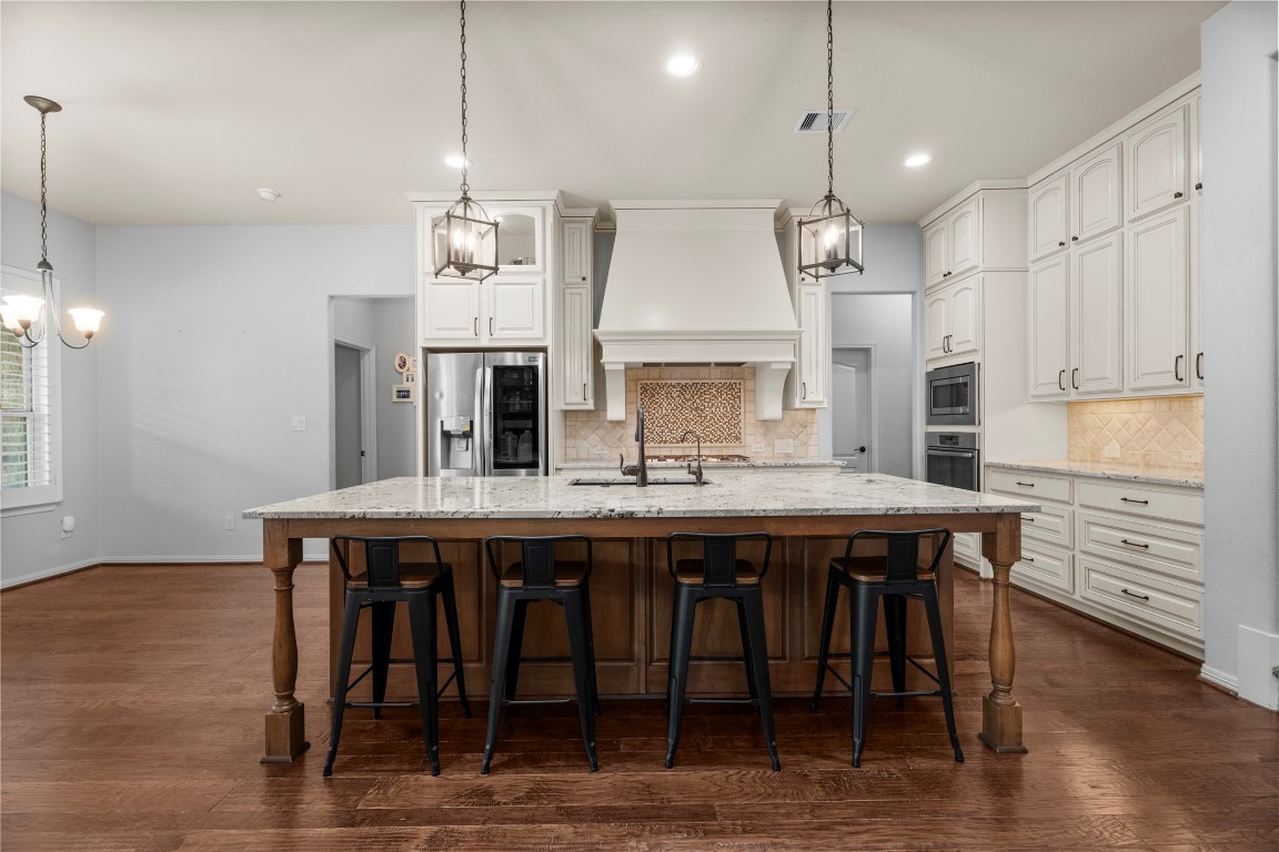 28507 Rose Vervain Drive Spring, TX 77386 - Photo 18 of 50 This kitchen is straight out of a magazine! Gorgeous granite, bar seating & tons of storage.