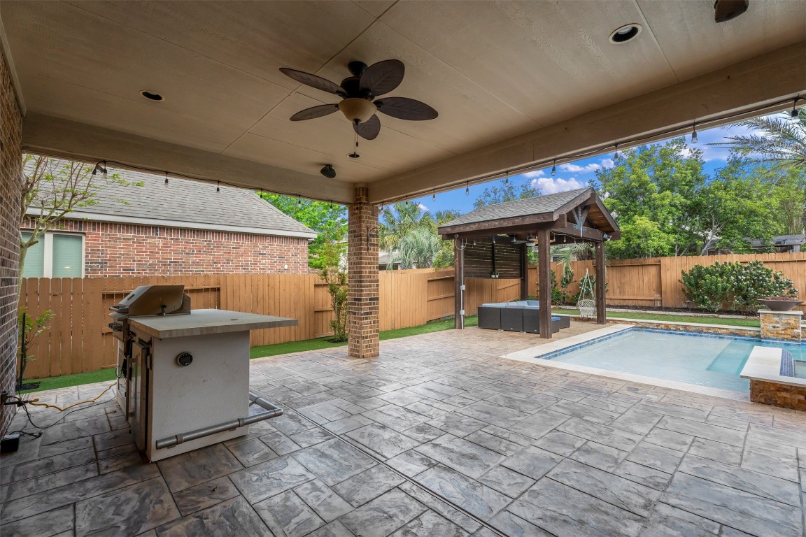 28507 Rose Vervain Drive Spring, TX 77386 - Photo 45 of 50 Huge covered outdoor spaces (over 600 SF) with kitchen.