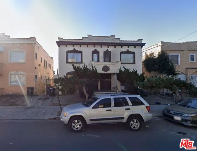 a car parked in front of a house