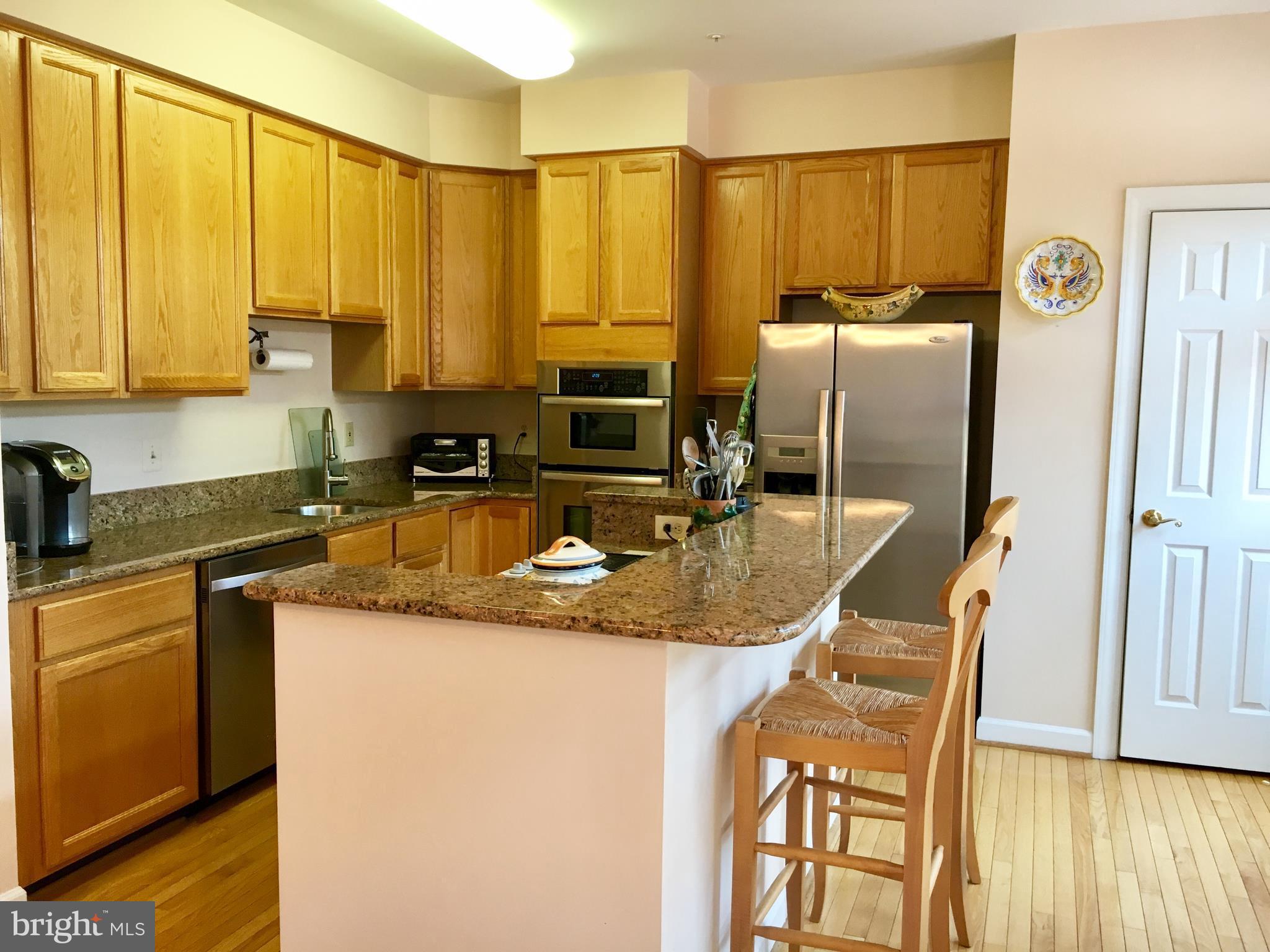 14205 Plum Run Way Silver Spring, MD 20906 - Photo 11 of 29 Updated kitchen w/gleaming hardwood floor
