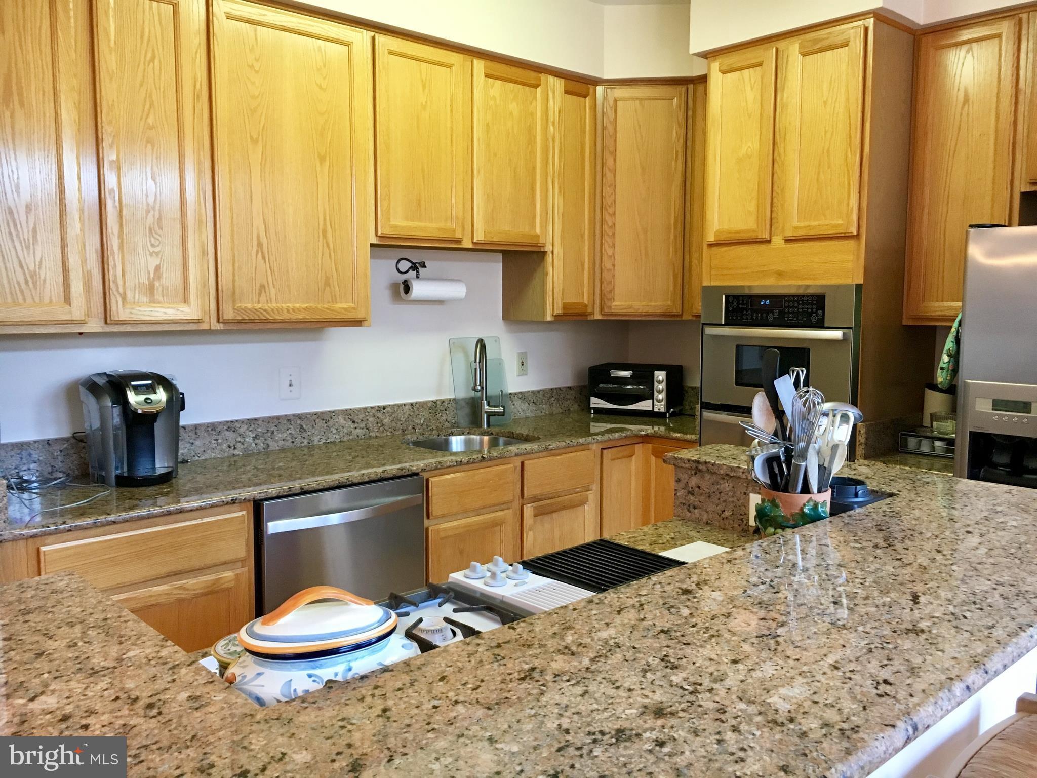 14205 Plum Run Way Silver Spring, MD 20906 - Photo 12 of 29 Kitchen w/breakfast bar